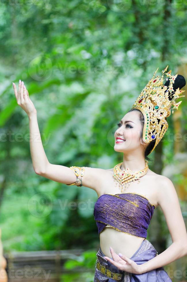 Beautiful Thai girl in Thai traditional costume photo