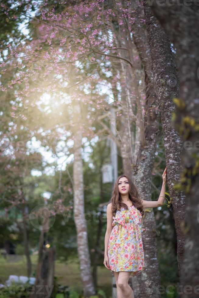 Beautiful young woman is waiting someone photo