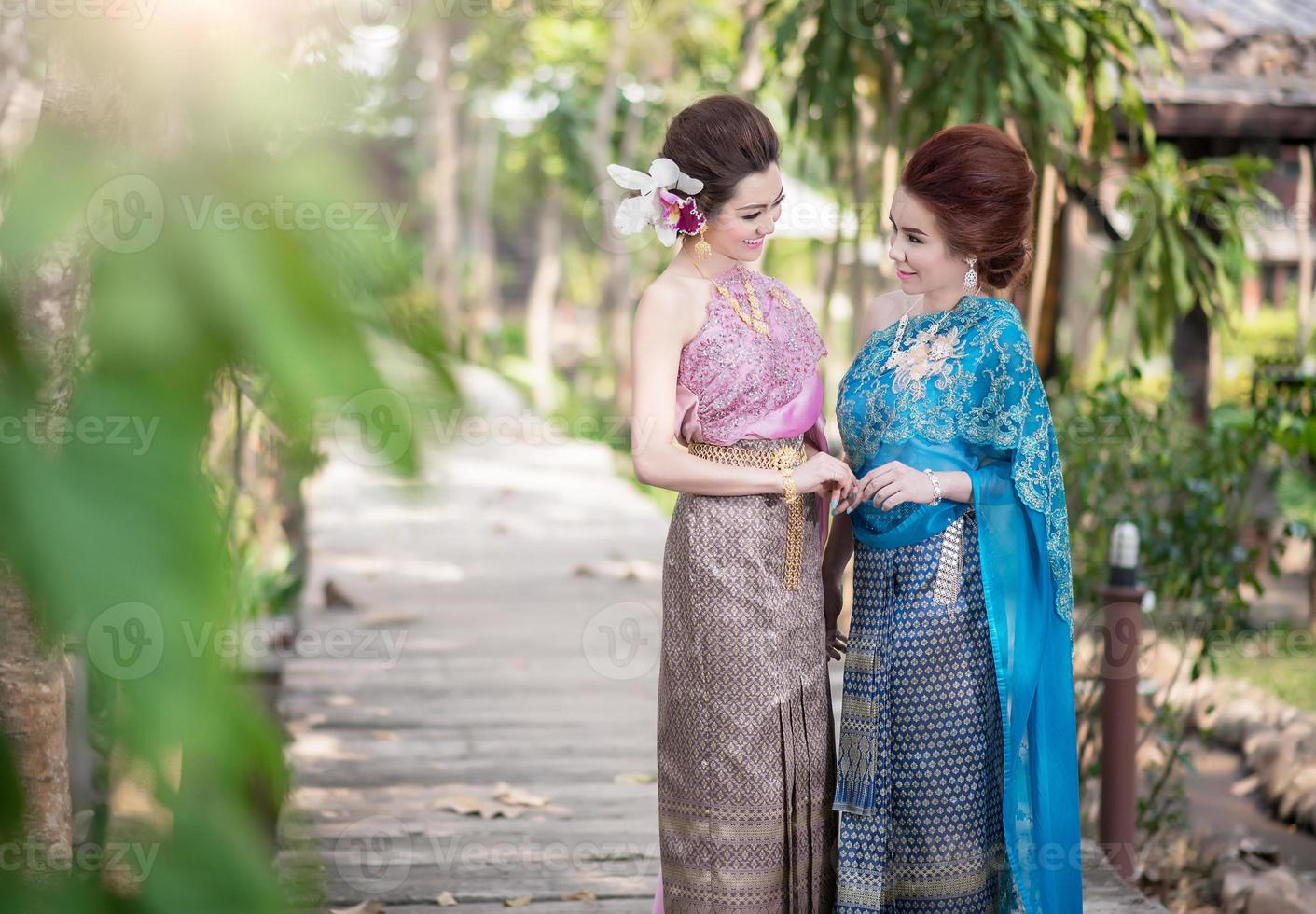 Two Beautiful Thai girls in Thai traditional costume photo