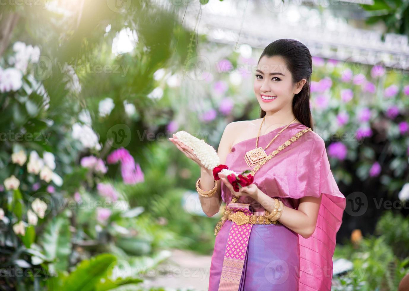 Beautiful Thai girl in Thai traditional costume photo