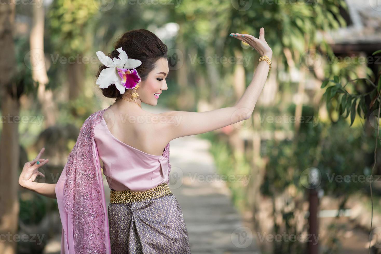 Beautiful Thai girl in Thai traditional costume photo