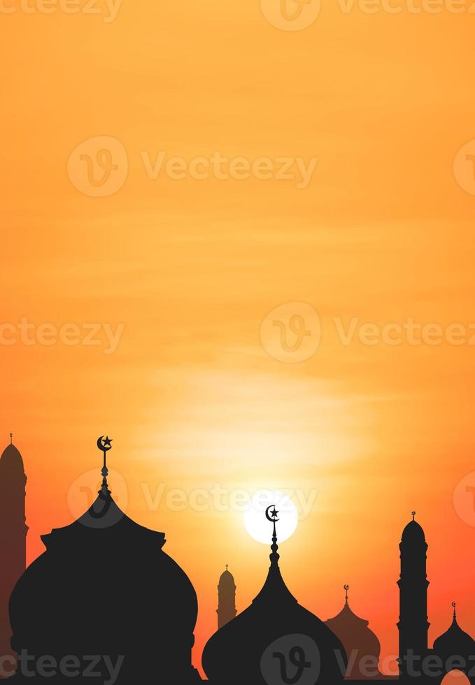 Silhouette Mosque domes against sunrise sky in the morning with beautiful orange sunlight in Iftar period during Ramadan Holy month photo