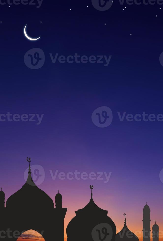 Silhouette Mosques Dome and Crescent Moon on dark blue Twilight sky in vertical frame, symbol islamic religion Ramadan and free space for text arabic, Eid al-Adha, Eid al-fitr, Mubarak photo