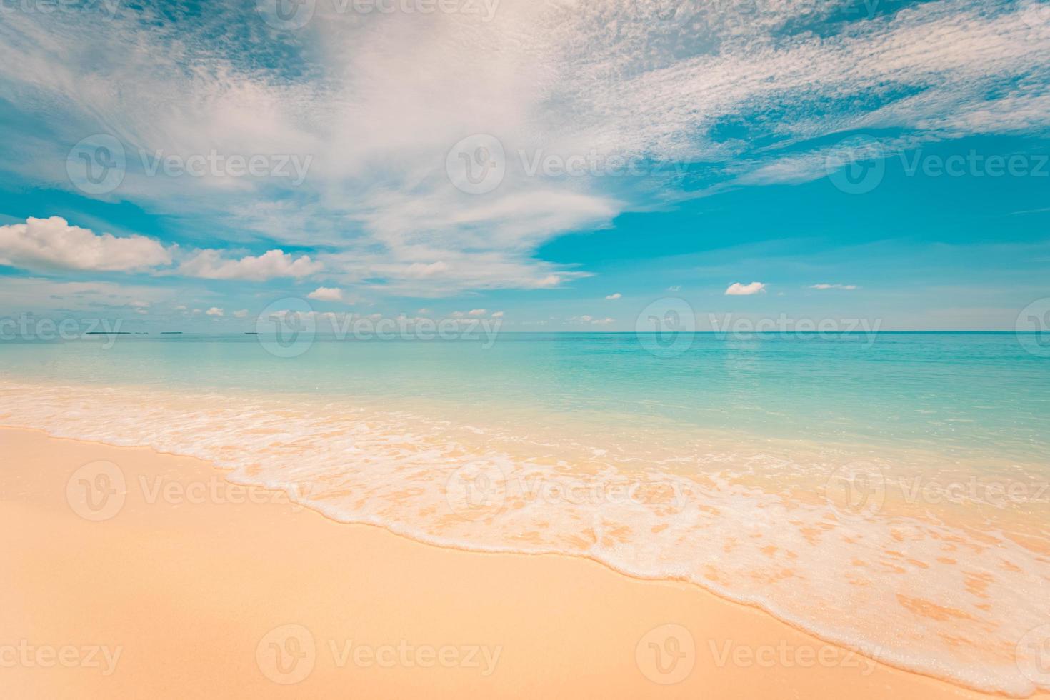 Empty beach scene, summer vacation or holiday concept, waves splashing under blue sky. Paradise island travel concept, tropical landscape scenery, wonderful summer mood. Calmness and inspirational photo