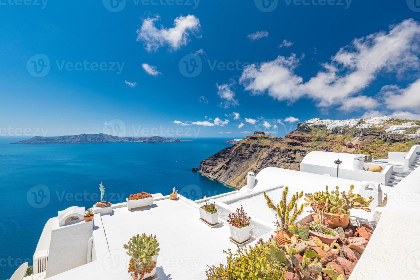 Santorini Island, Greece. Amazing white architecture, blue sky and relaxing summer mood. Vibes, travel and vacation background. Beautiful summer holiday scenery. Europe travel holiday, inspirational photo