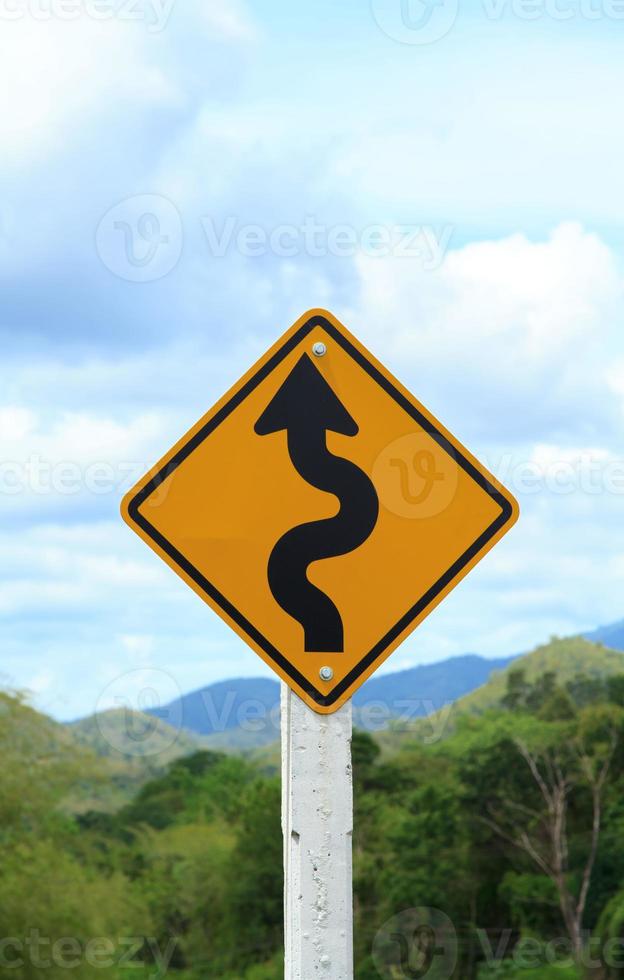 Traffic signs, many curvy roads on the mountains. Please drive carefully and please use low gear when traveling. photo