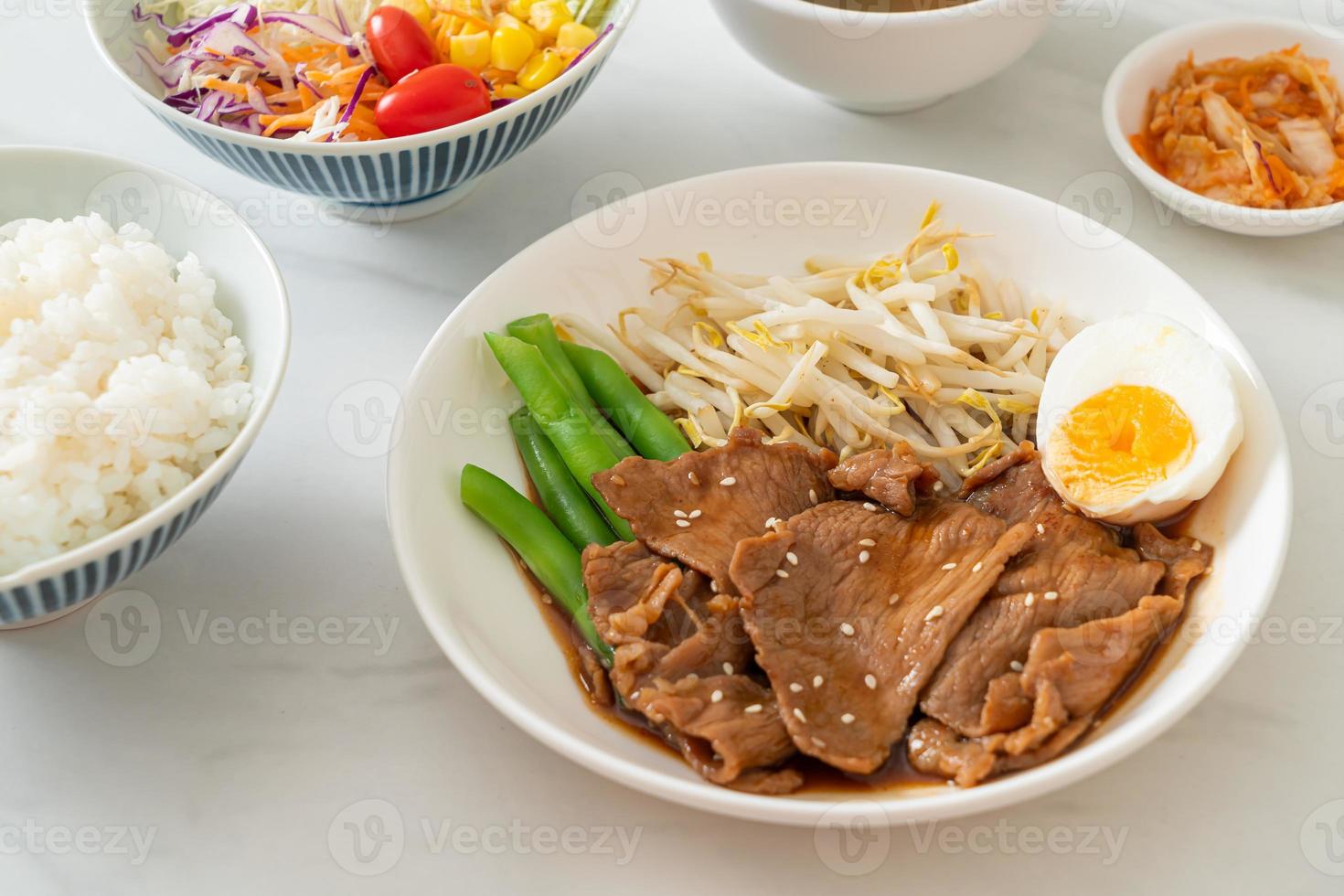 stir-fry Teriyaki Pork with sesame seeds ,mung bean sprouts, boiled egg and rice set photo