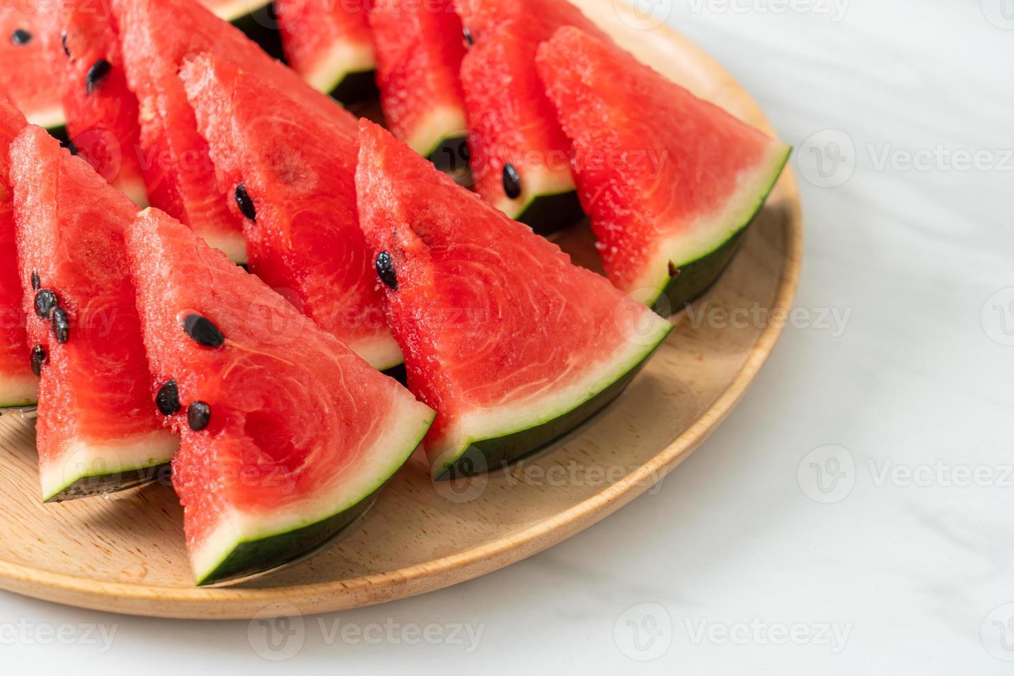 fresh watermelon sliced on plate photo