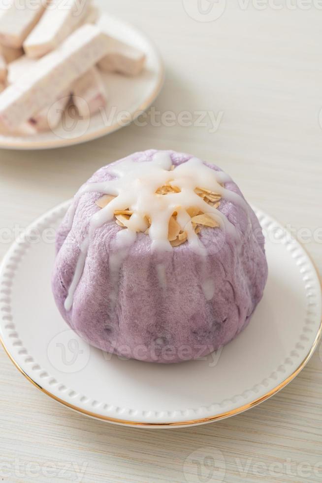 taro bun with white sugar cream and nut photo