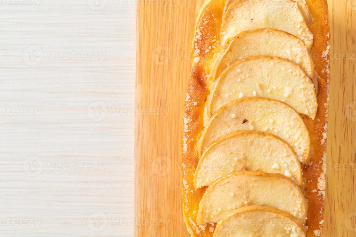 apple loaf crumbled on wood board photo