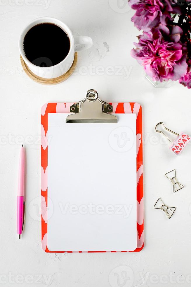 Flat lay feminine home office photo