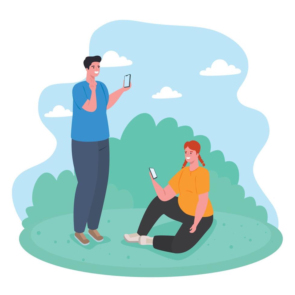 young couple using smartphones outdoor, social media and communication technology concept vector