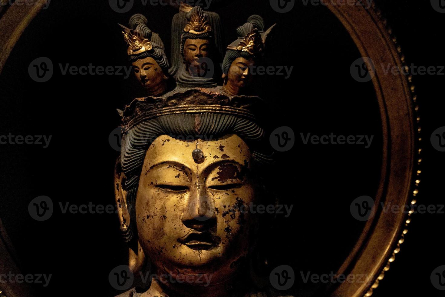 Japanese Buddah statue isolated close up photo