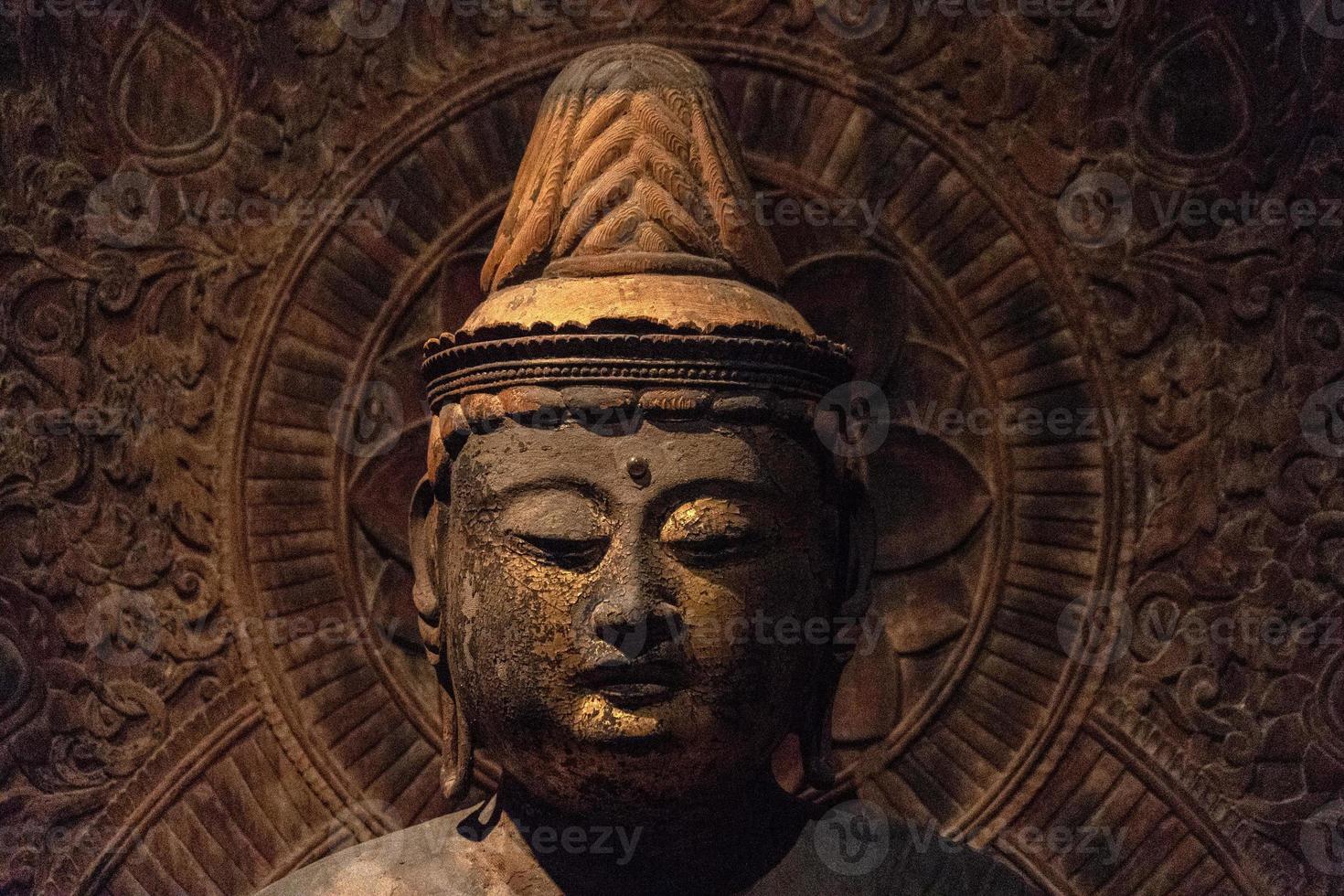 Japanese Buddah statue isolated close up photo