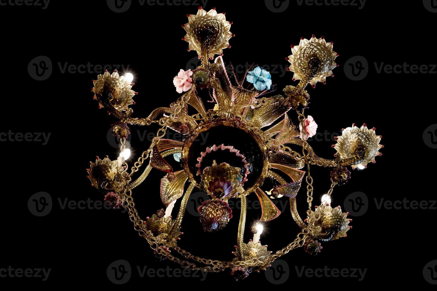 murano glass chandelier isolated on black photo