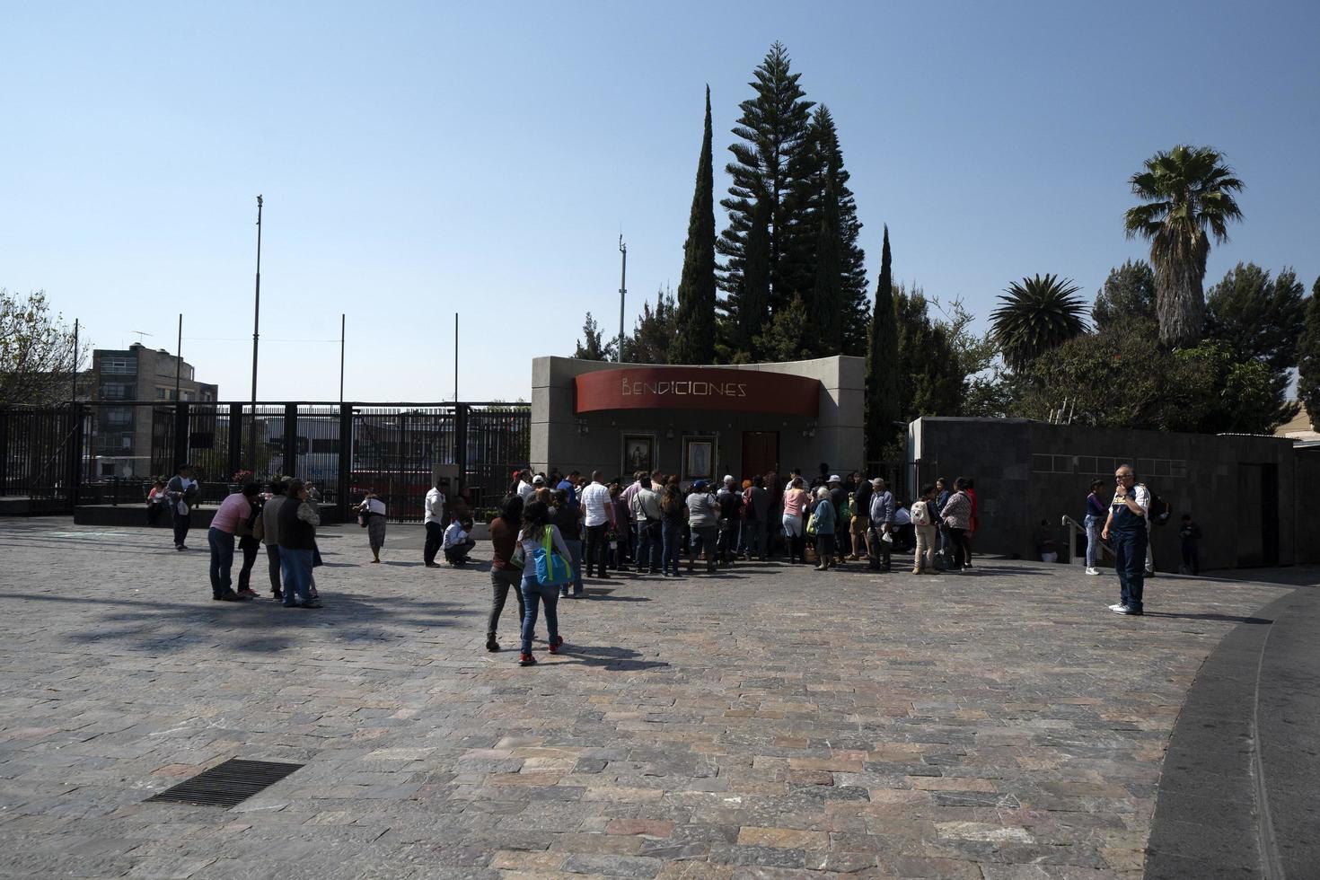 MEXICO CITY, MEXICO - JANUARY 30 2019 - Pilgrims at Guadalupe Cathedral photo