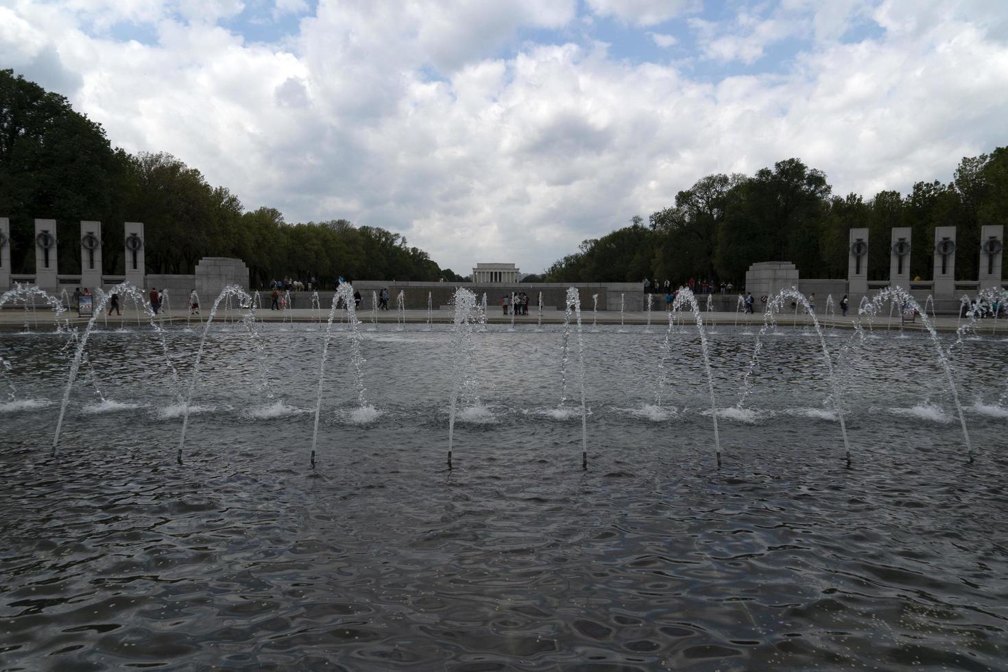 WASHINGTON DC, USA - APRIL 27 2019 - Many tourist at World War II Memorial photo