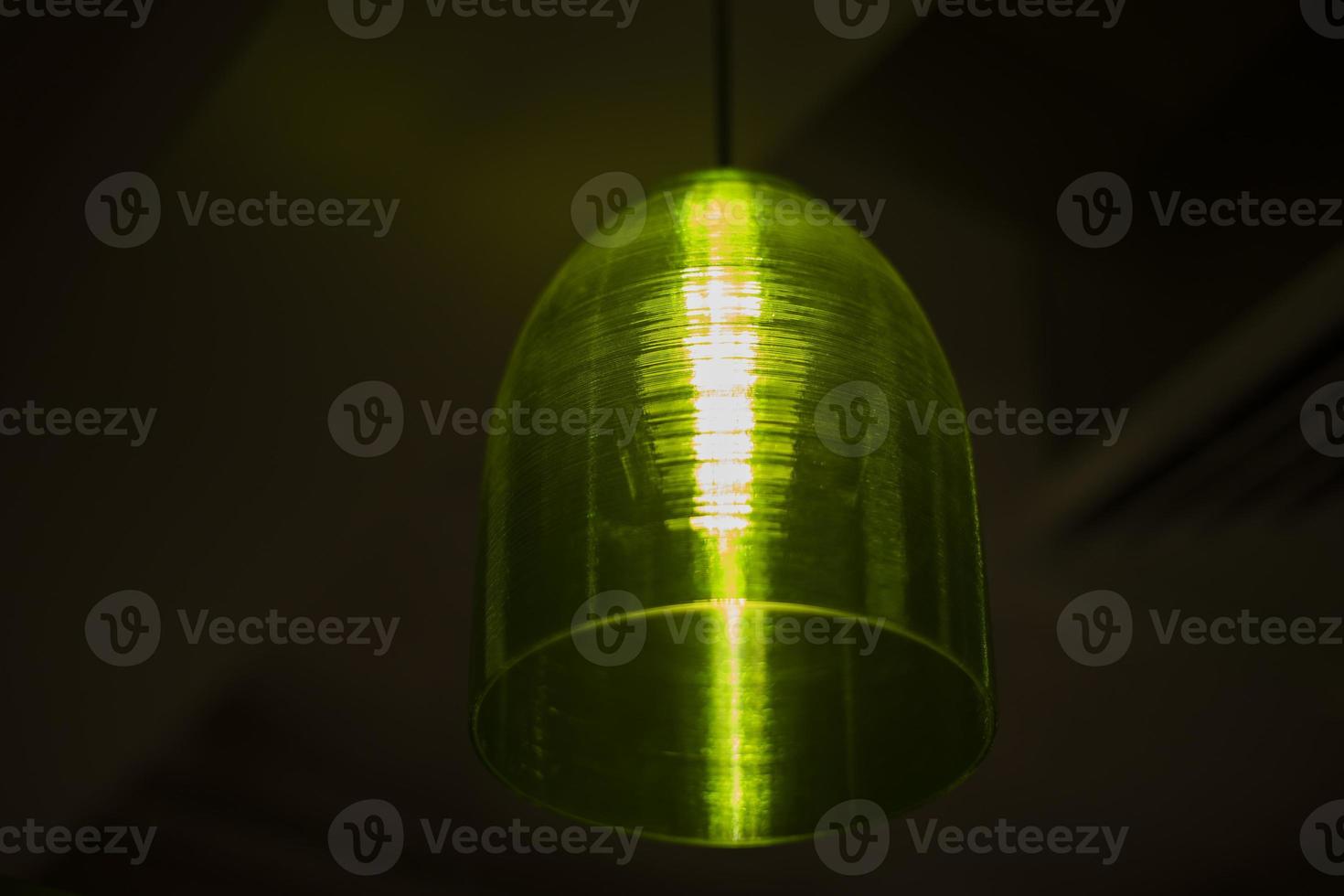 Green lamp. Interior item. O Illuminating device and plastic lampshade. photo