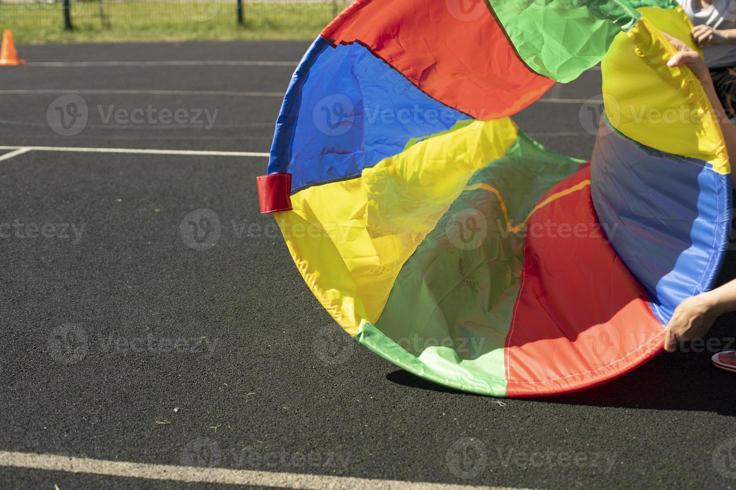 Sports equipment in summer. Colored fabric. Ring for soprive relay. photo