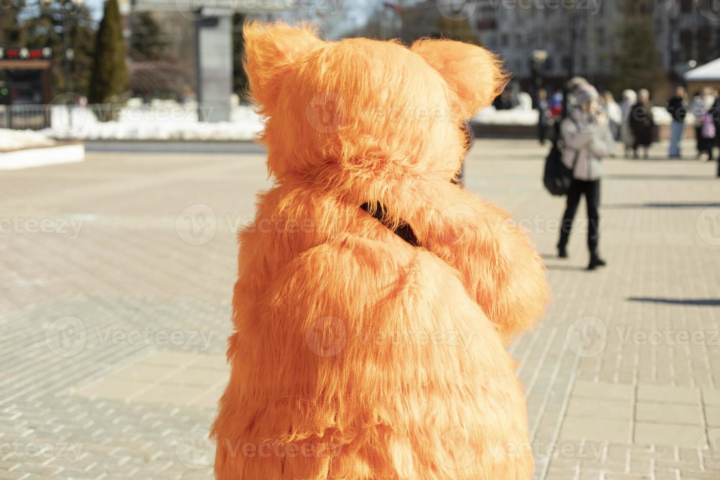 Figure of jumping animal. Orange fox. photo