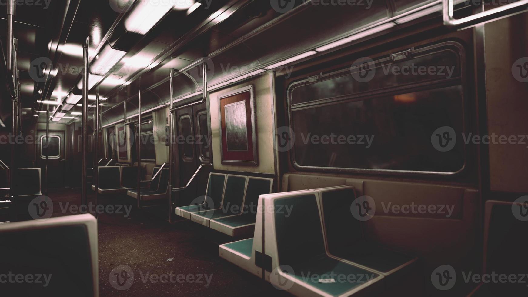 Empty benches of metro wagon photo