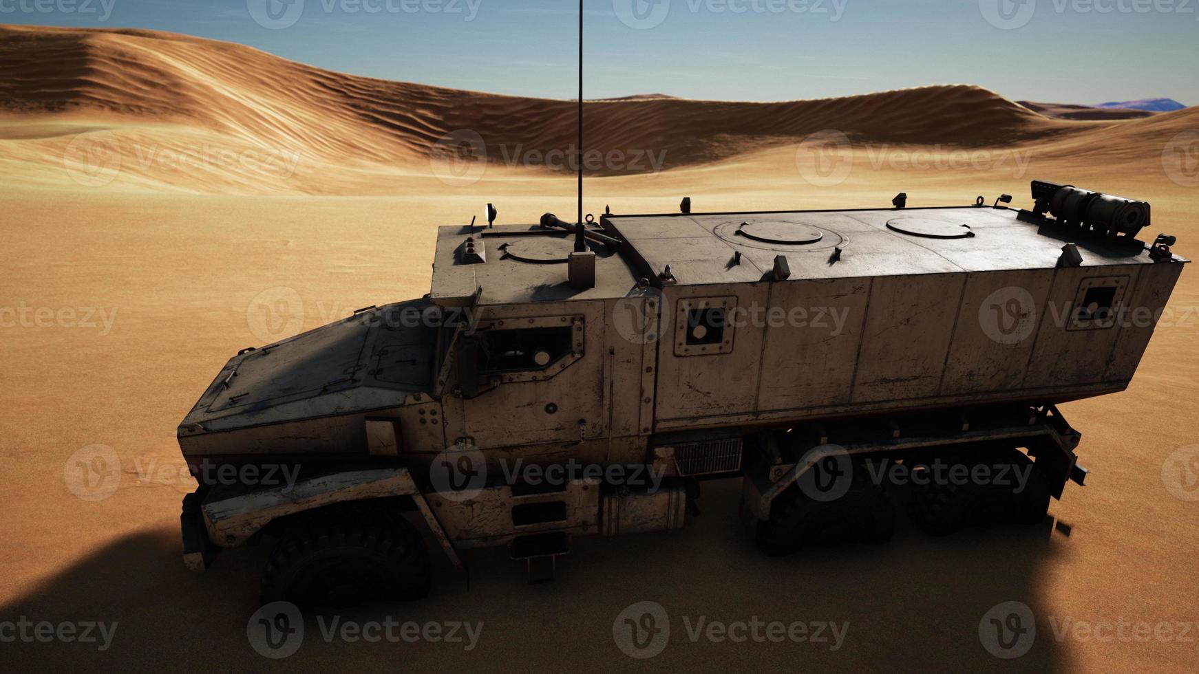 Armoured military truck in desert photo