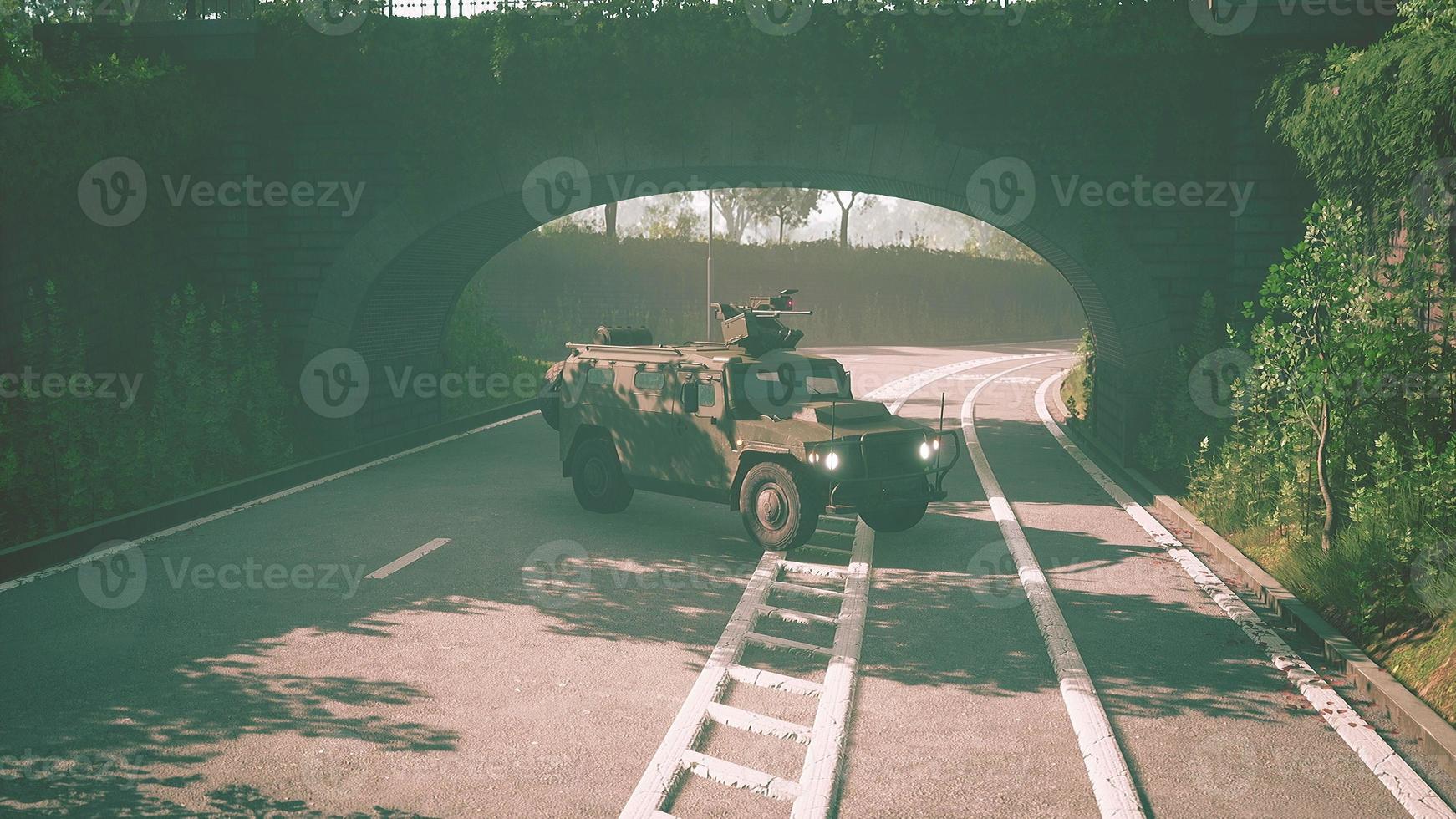 armored military car in big city photo