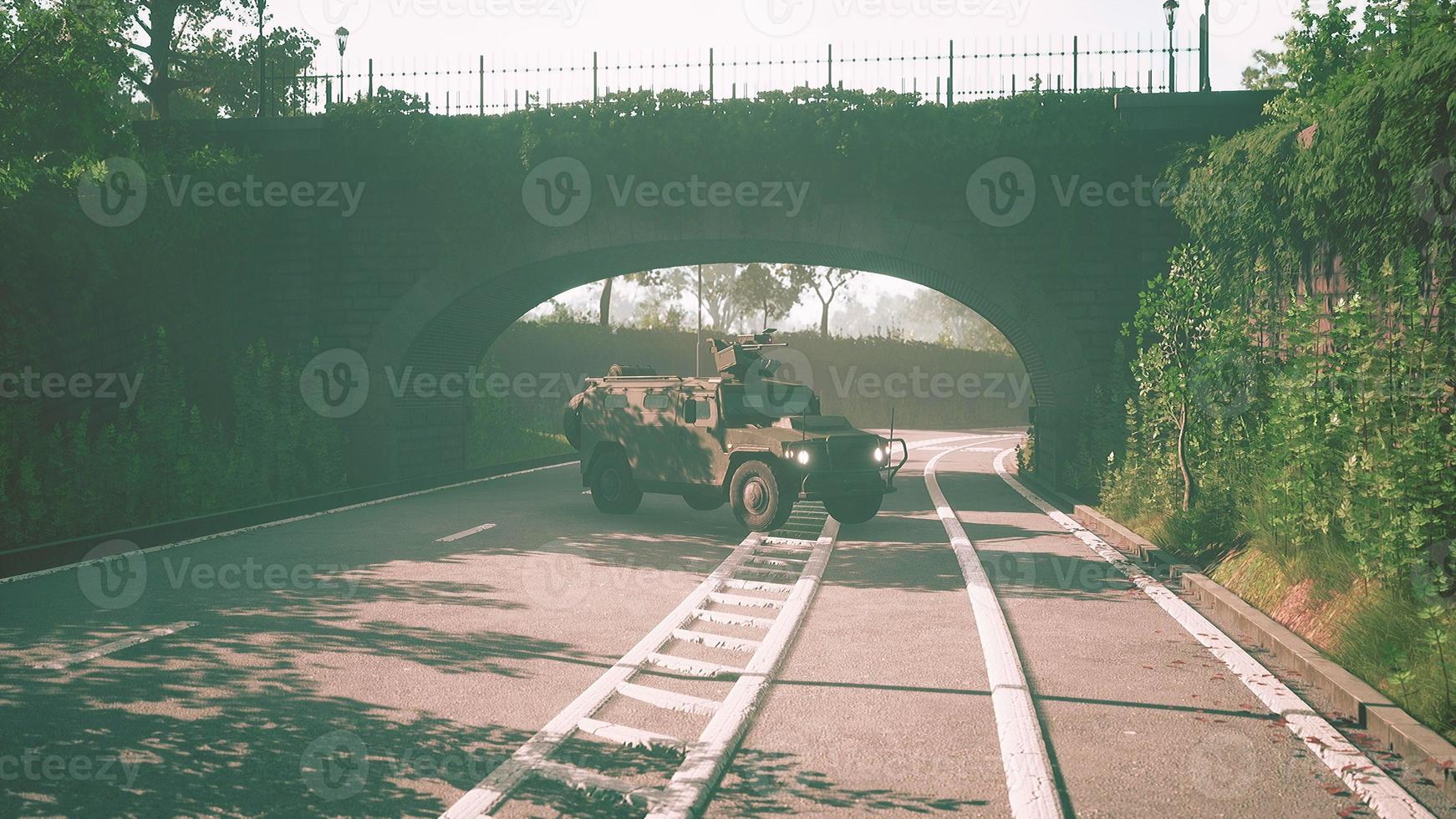 armored military car in big city photo