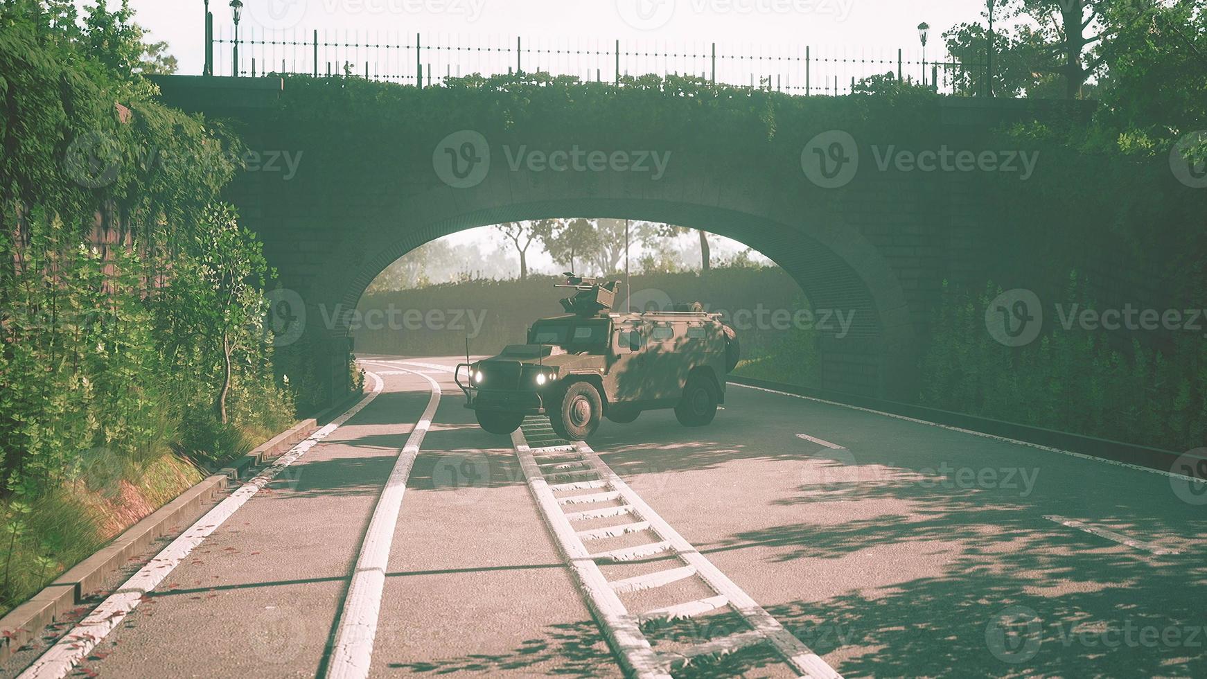 armored military car in big city photo