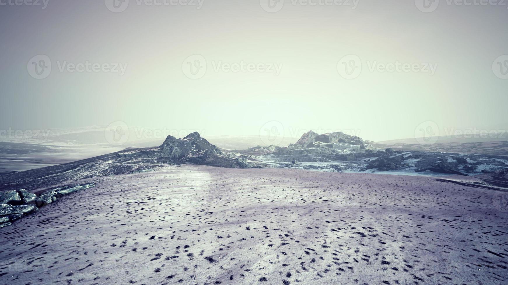 Dramatic winter dark desert steppe on a highland mountain plateau photo