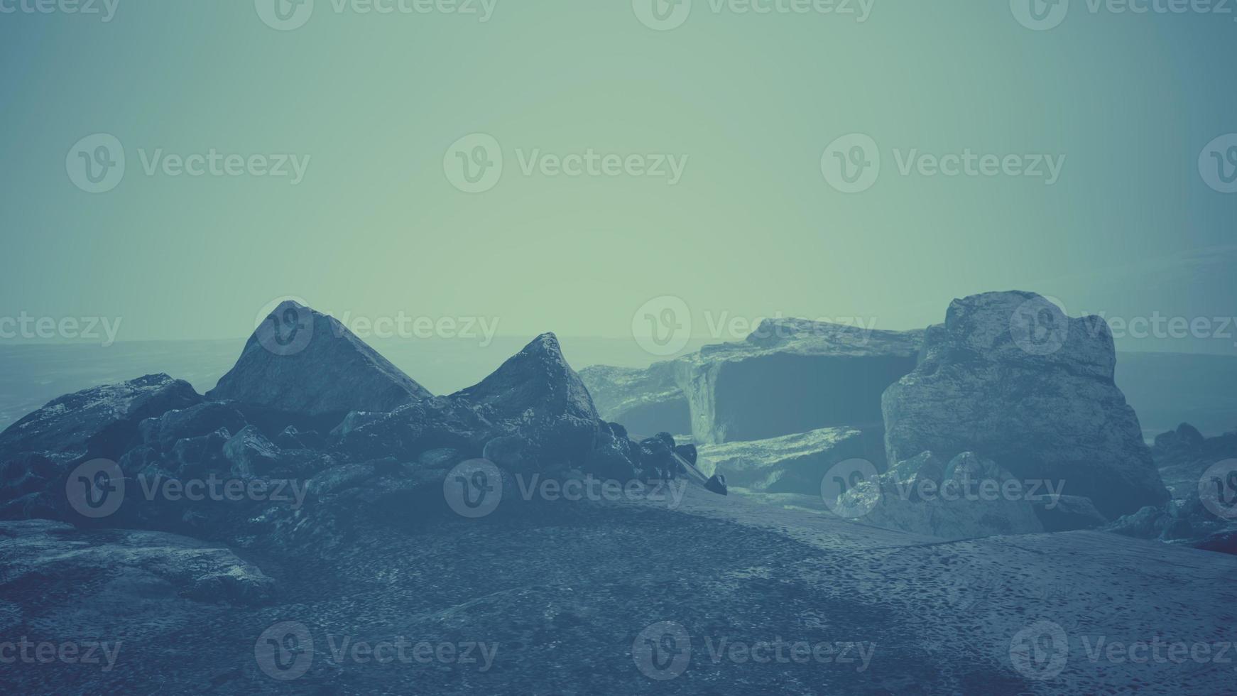 Dramatic winter dark desert steppe on a highland mountain plateau photo