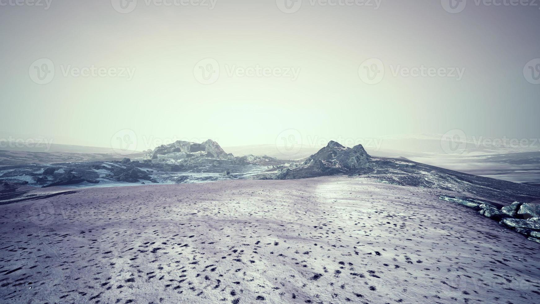 Dramatic winter dark desert steppe on a highland mountain plateau photo