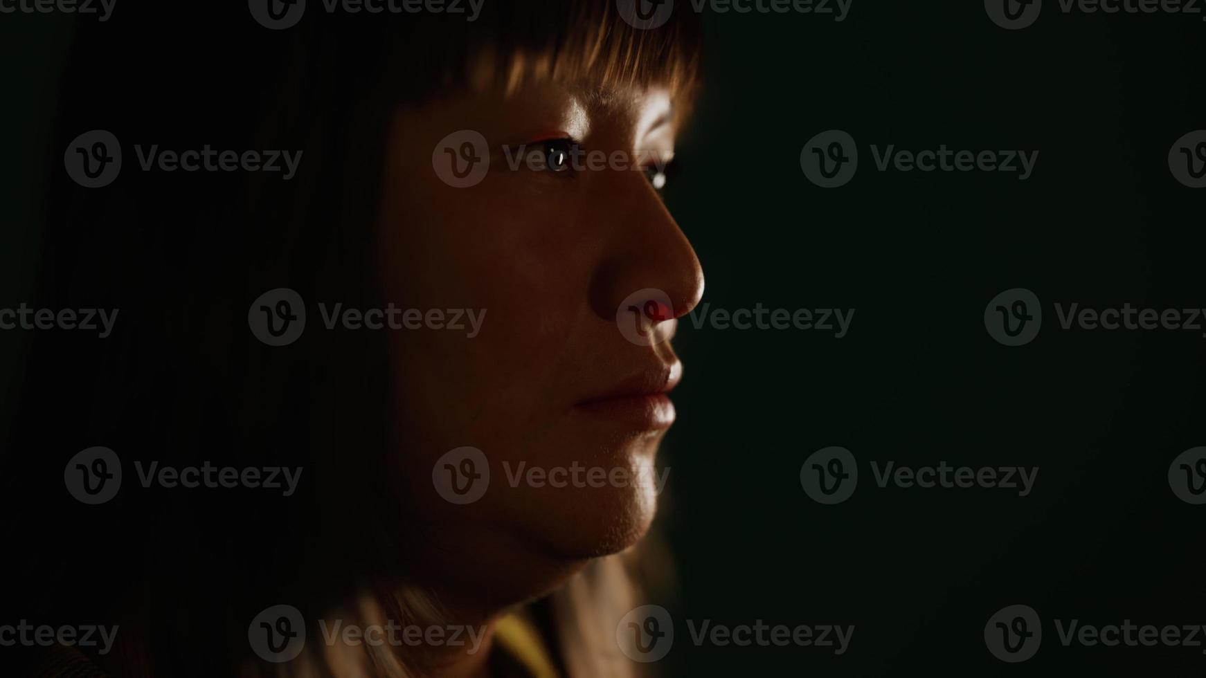 adult Mexican lady portrait in the dark photo