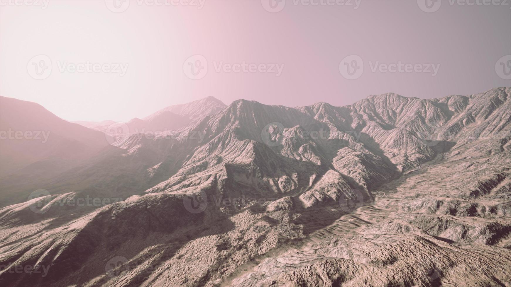 View of the Afghan mountains in fog photo