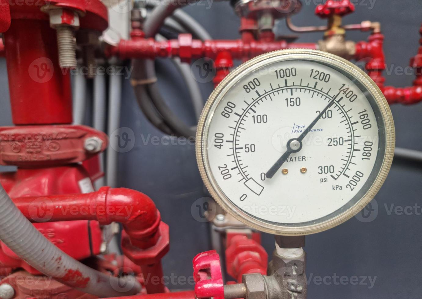 Pressure gauge for measuring installed in water system photo