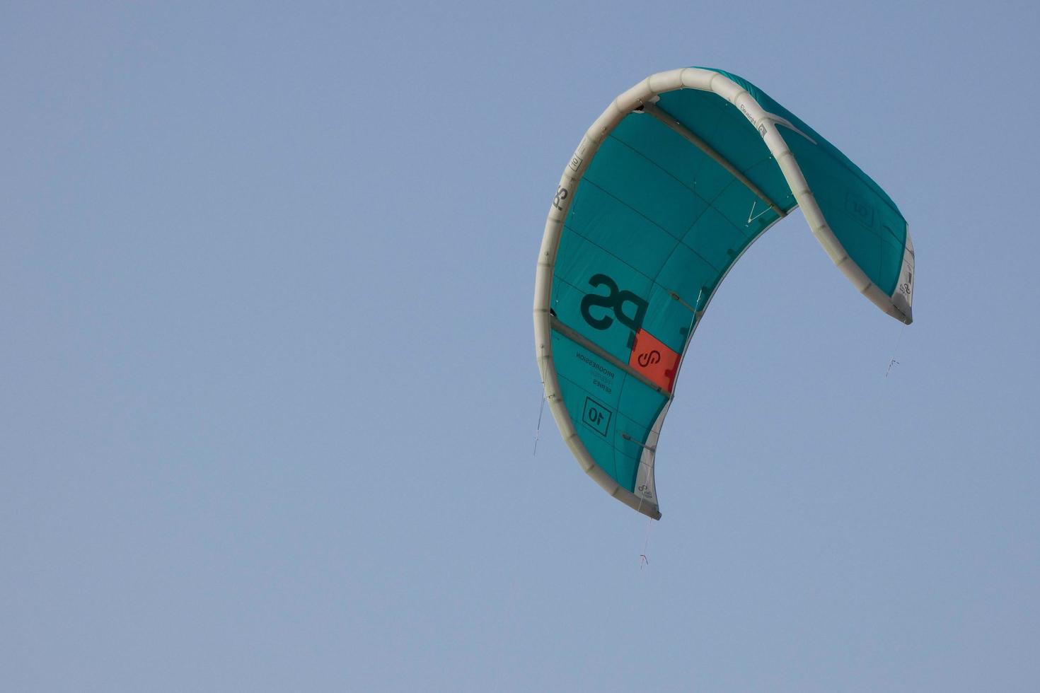 windsurfing, kitesurfing, water and wind sports powered by sails or kites photo