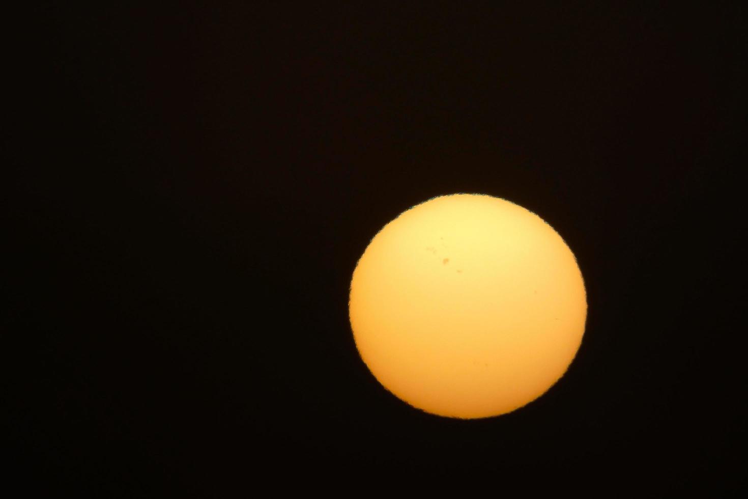 sun the sun, at sunset at the end of the day, essential for the life of the planet photo
