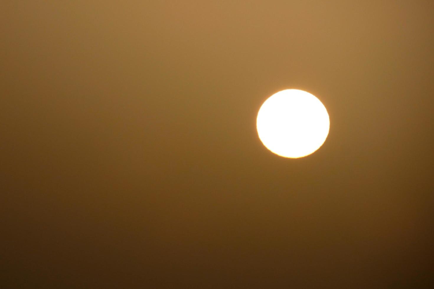 sun the sun, at sunset at the end of the day, essential for the life of the planet photo