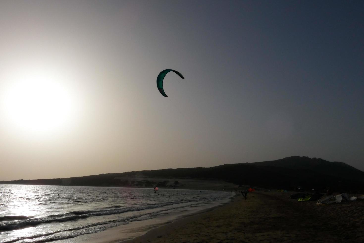 windsurfing, kitesurfing, water and wind sports powered by sails or kites photo
