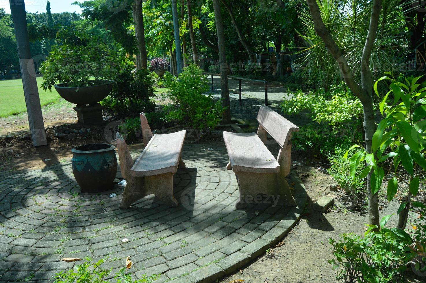 corner view of the park with benches for seating photo