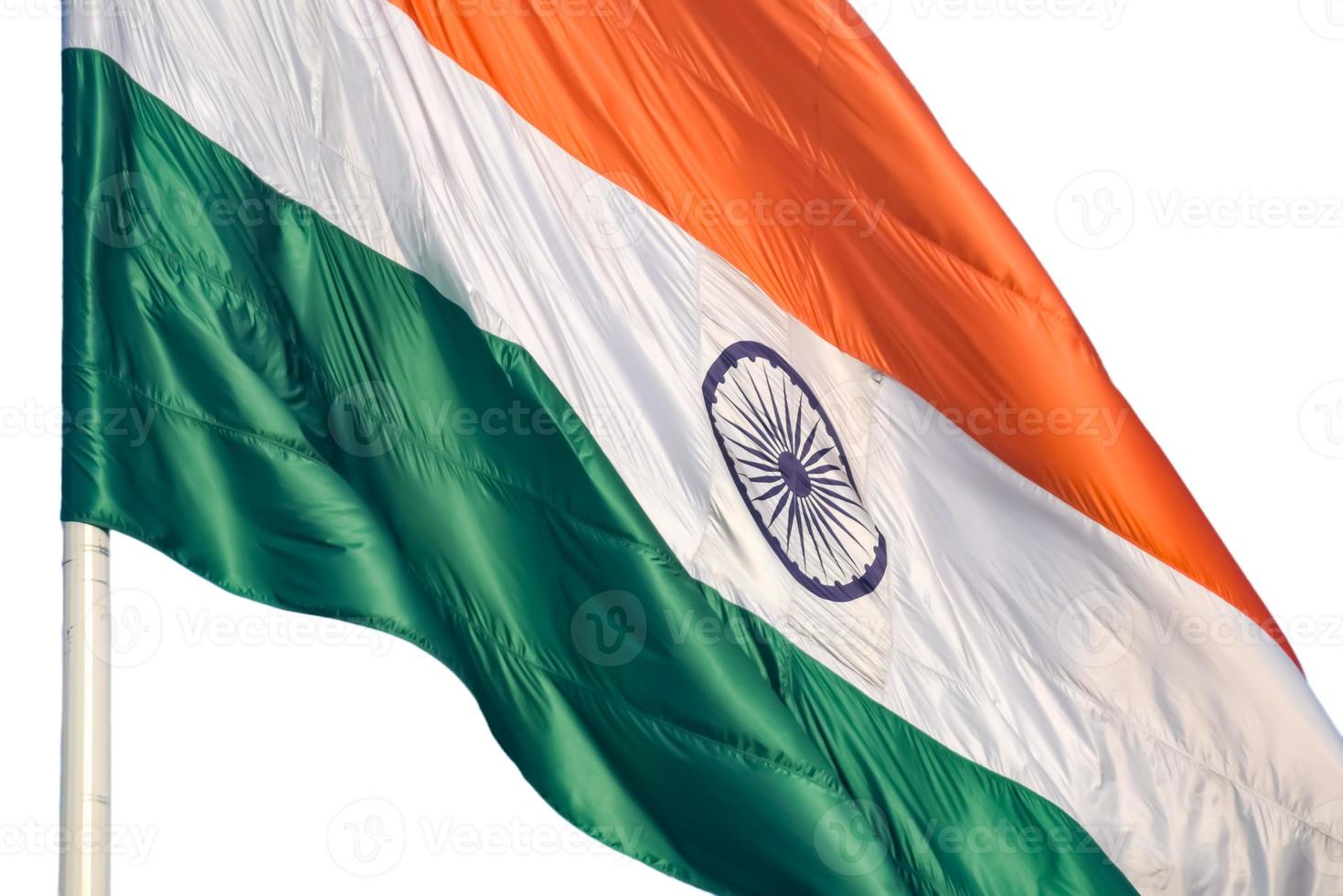 India flag flying high at Connaught Place with pride with plain white background, India flag fluttering, Indian Flag on Independence Day and Republic Day of India, tilt up shot, Har Ghar Tiranga photo