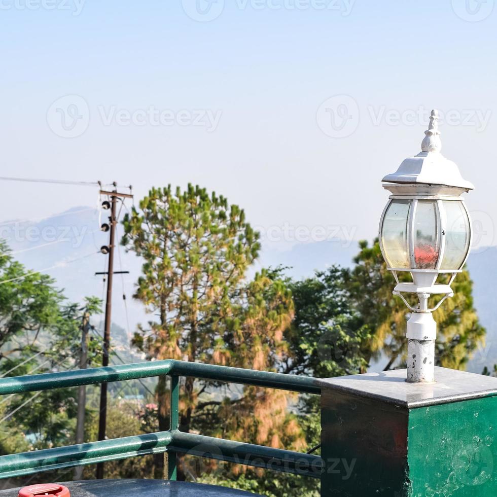 Early morning view of Modern rooftop restaurant at Kasauli, Himachal Pradesh in India, View of mountain hills from open air restaurant in Kasauli, Kasauli Rooftop restaurant photo