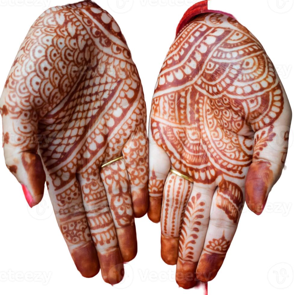 Beautiful woman dressed up as Indian tradition with henna mehndi design on her both hands to celebrate big festival of Karwa Chauth with plain white background photo