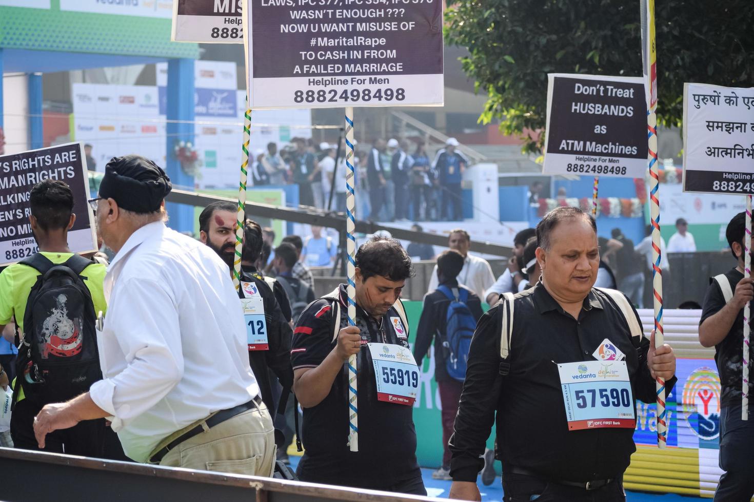 New Delhi, India - October 16 2022 - Vedanta Delhi Half Marathon race after covid in which marathon participants about to cross the finish line, Delhi Half Marathon 2022 photo