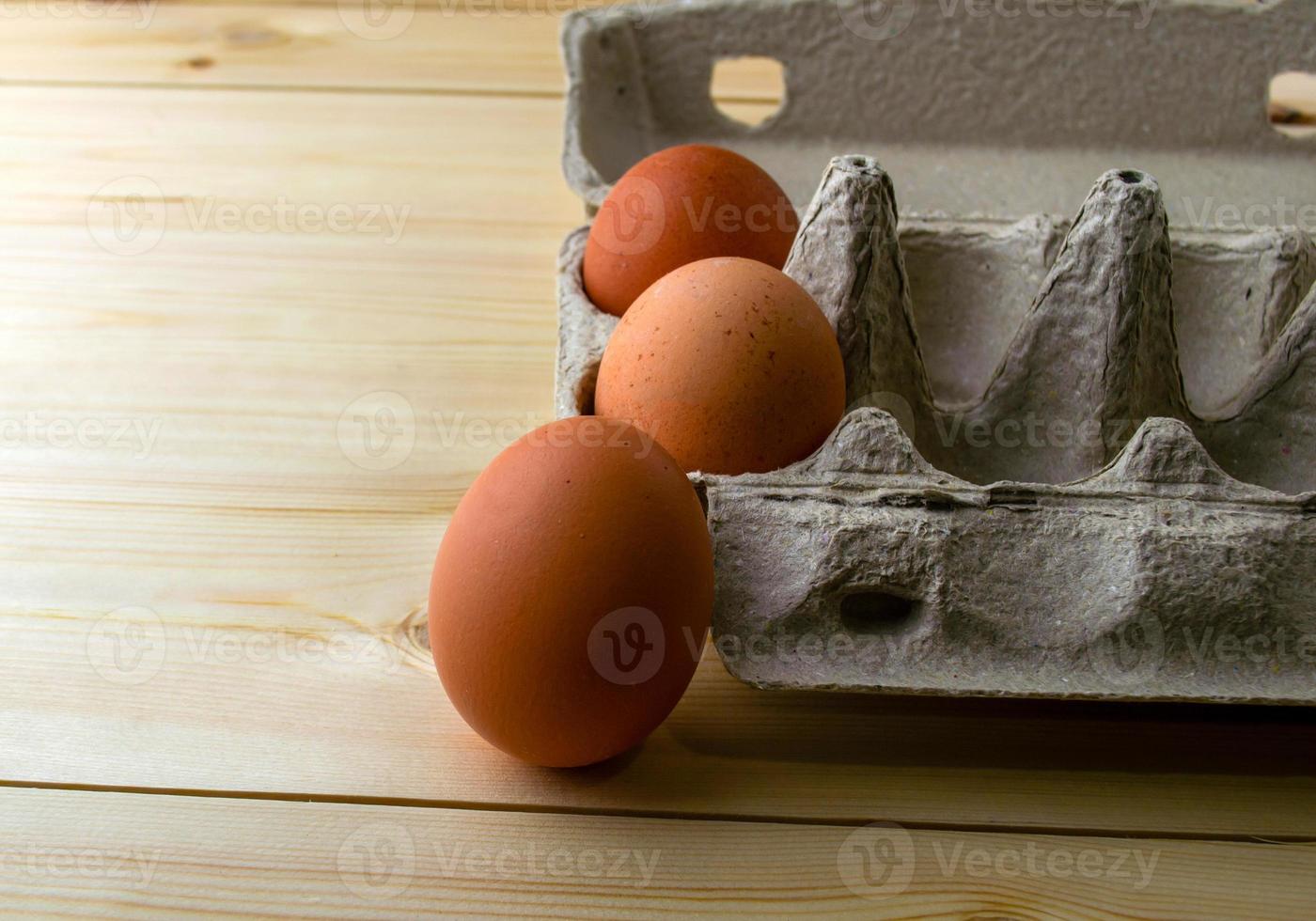 Eggs in a cardboard box close-up. photo