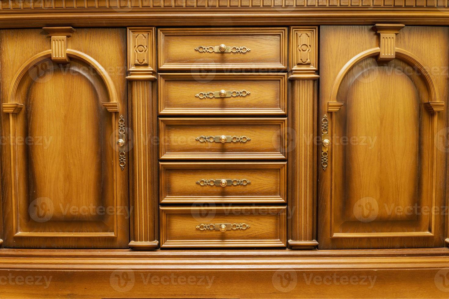 Wooden chest of drawers in the bedroom photo