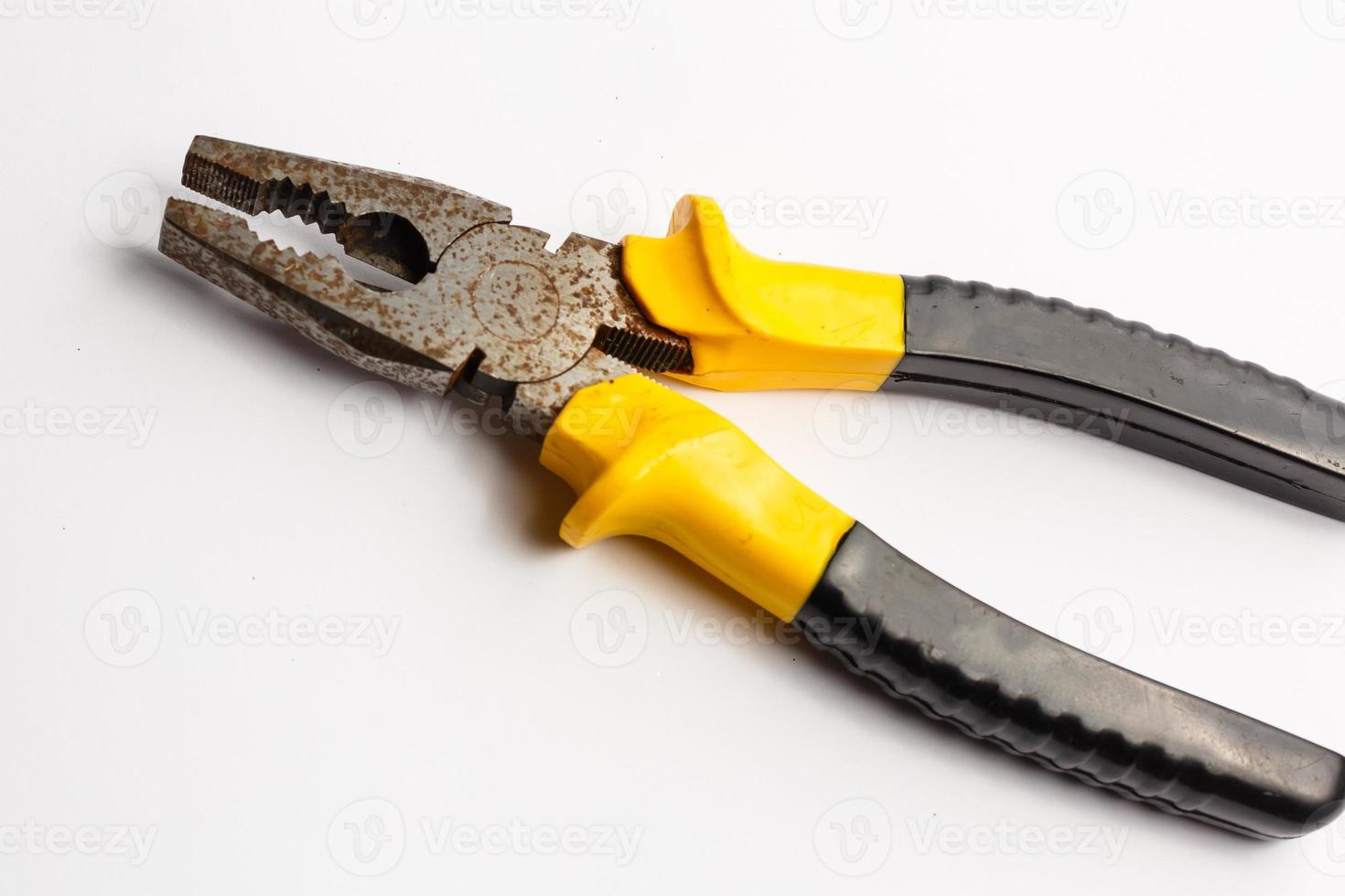 Pliers isolated on white background photo