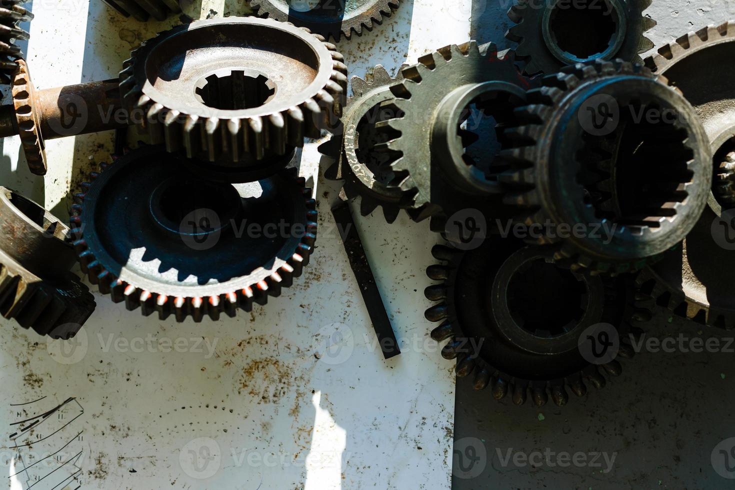 engine parts put on paper selective focus photo