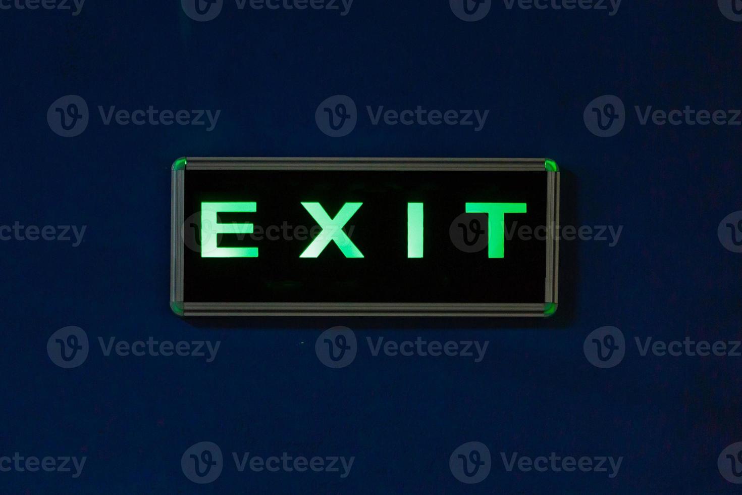 Inscription exit on a blue background photo