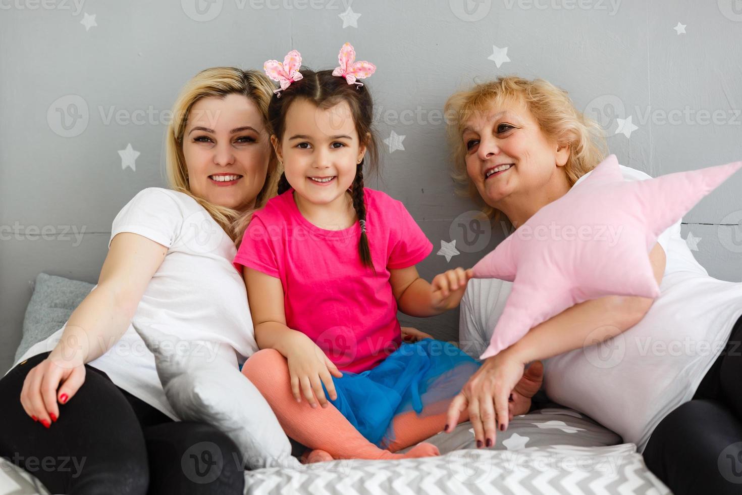 happy family on a cozy sofa in living room at home, family funny activity photo